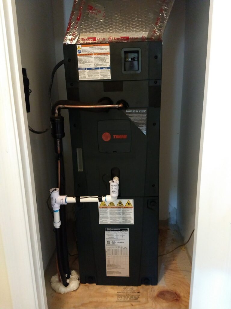 Open mechanical or utility closet with HVAC equipment