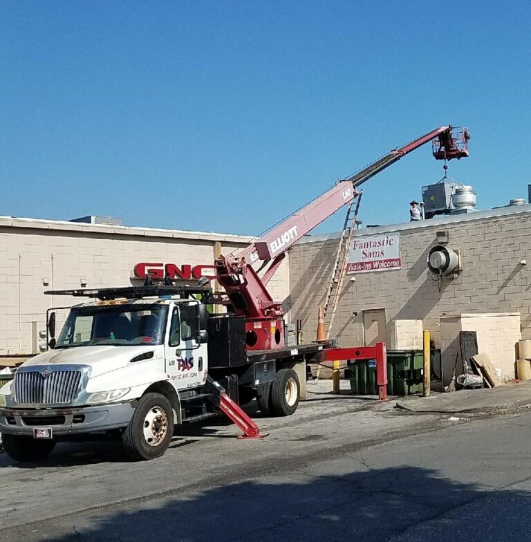 Service truck parked outside a commercial or industrial property