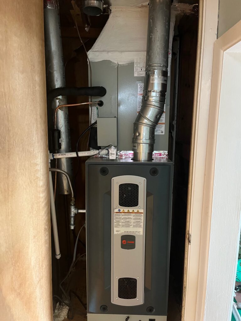 Vertical indoor HVAC or electrical system inside a utility closet