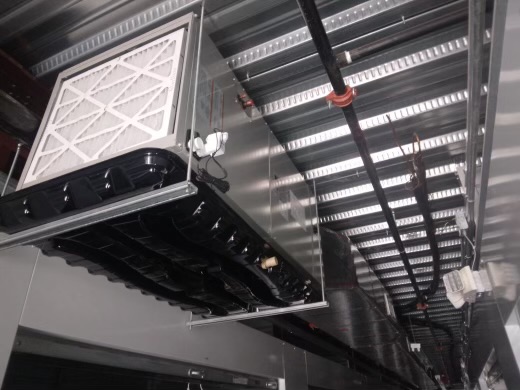 Exposed ductwork and piping in a commercial ceiling